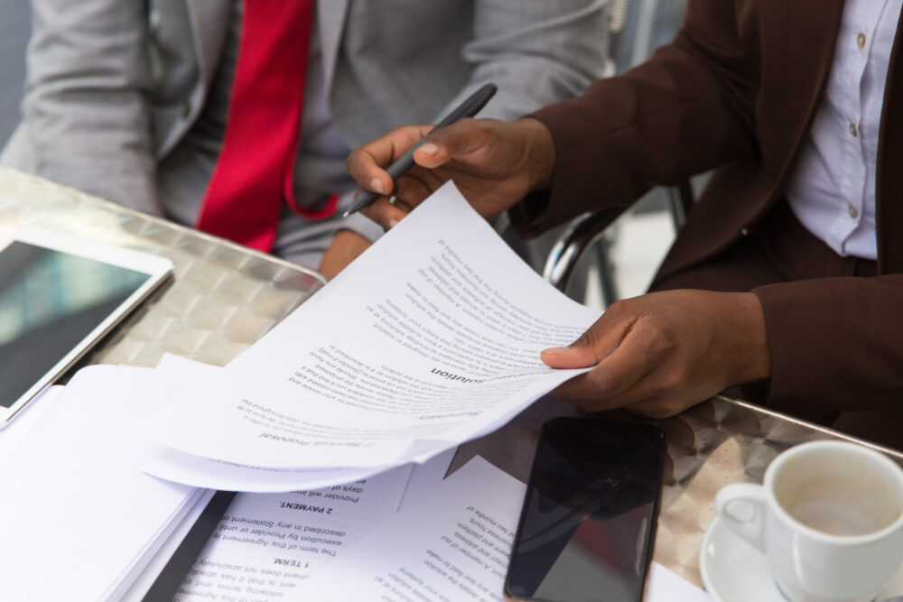 image showing hands holding a paper - rhinobay energy