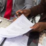 image showing hands holding a paper - rhinobay energy