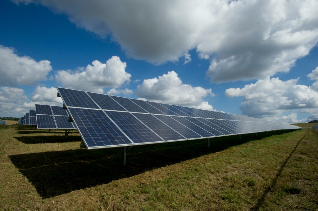 image showing solar panels in a field
