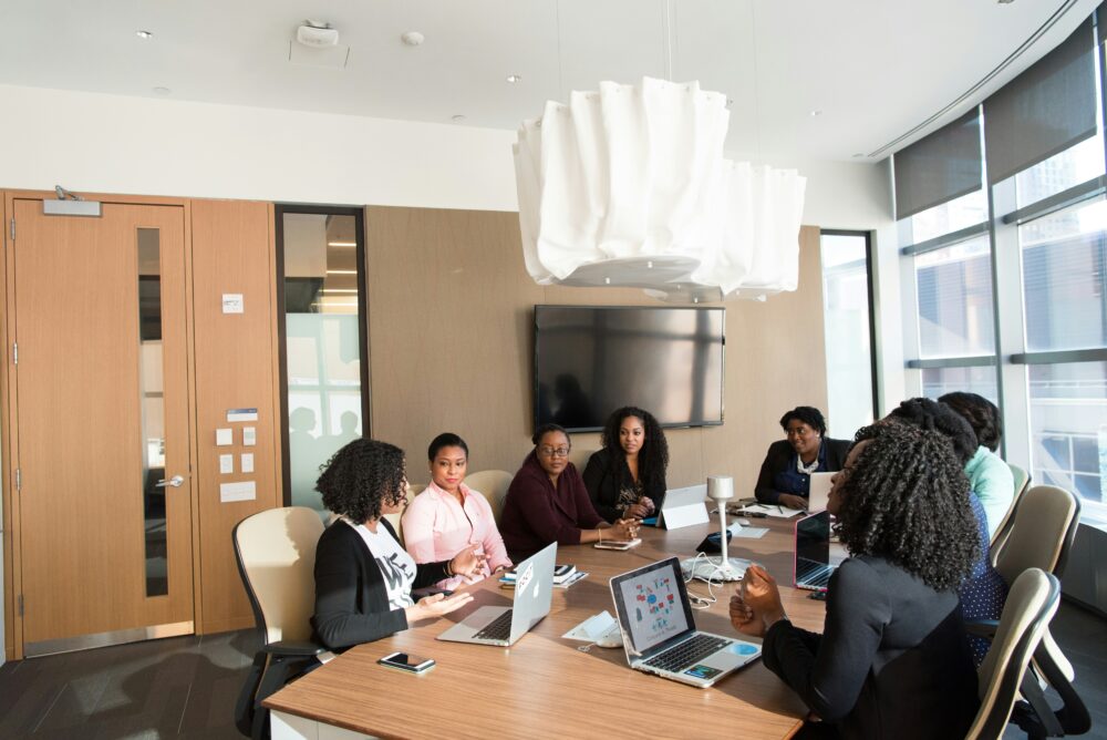 image of workers having an office meeting
