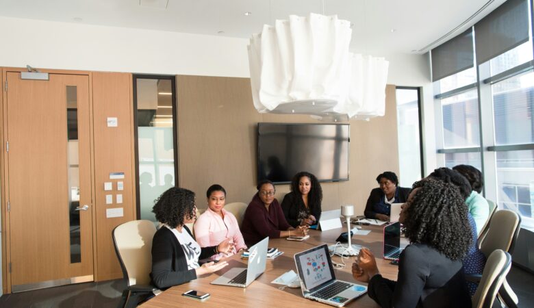image of workers having an office meeting