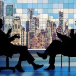 image showing two people discussing - rhinobay energy