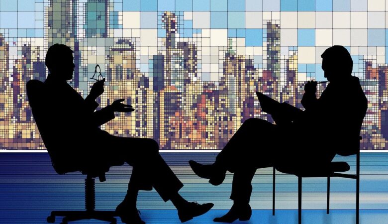 image showing two people discussing - rhinobay energy